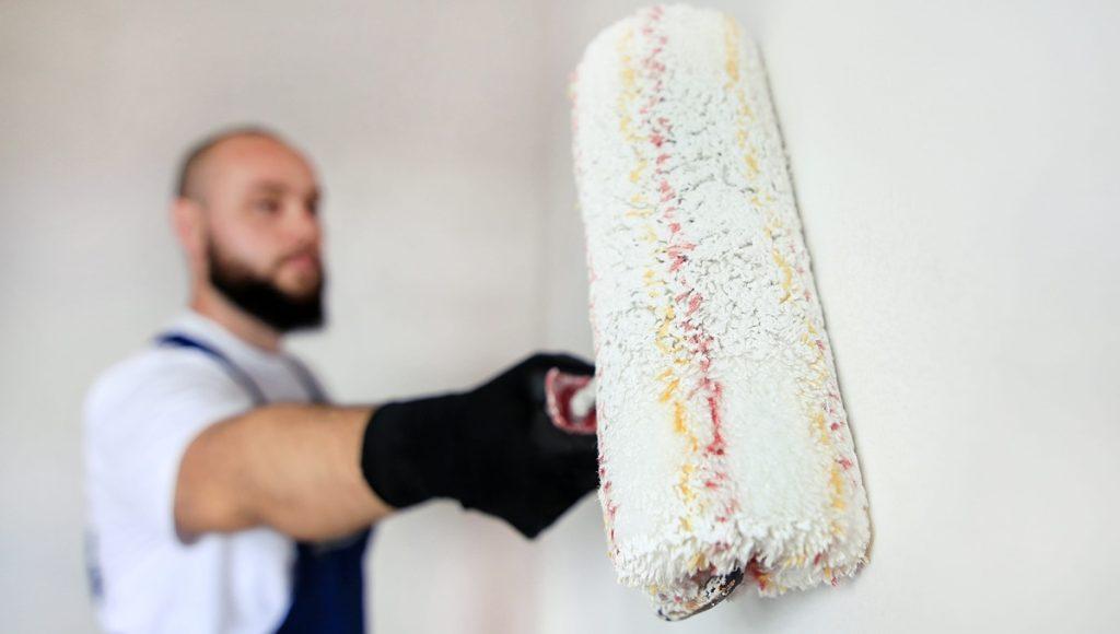 Construction worker doing finish renovation at an apartment