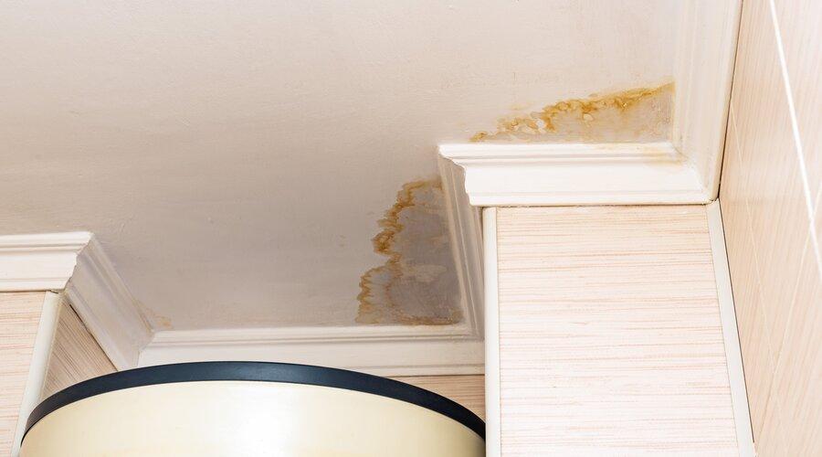 Water leak damaged ceiling and stain on the ceiling