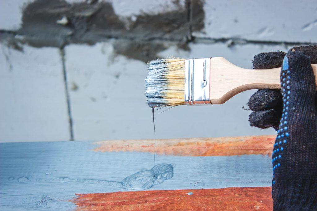 Painting a concrete retaining wall