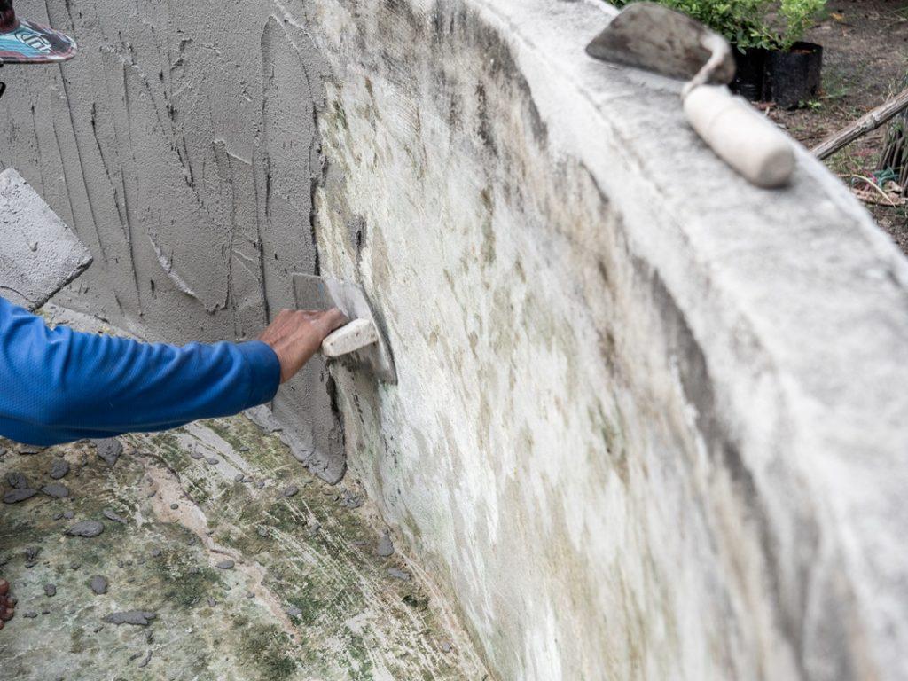 Priming a concrete wall
