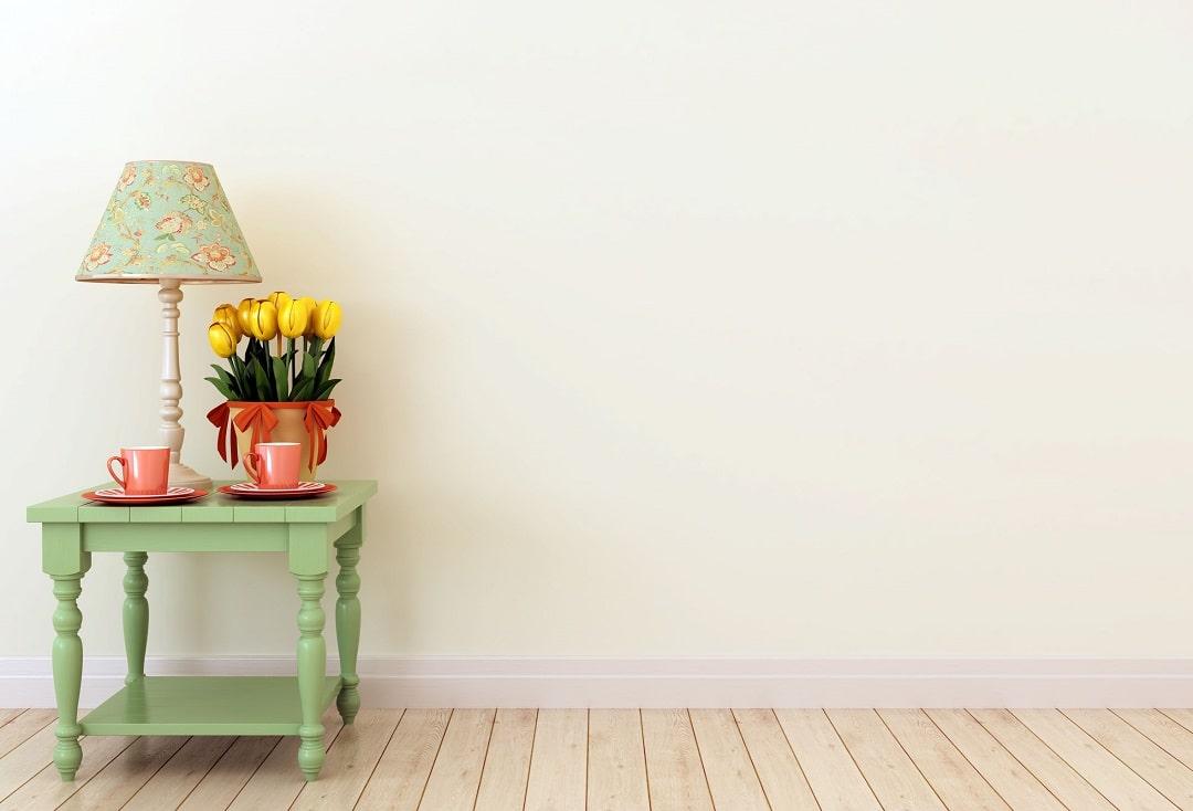Freshly painted wall and a table with flowers