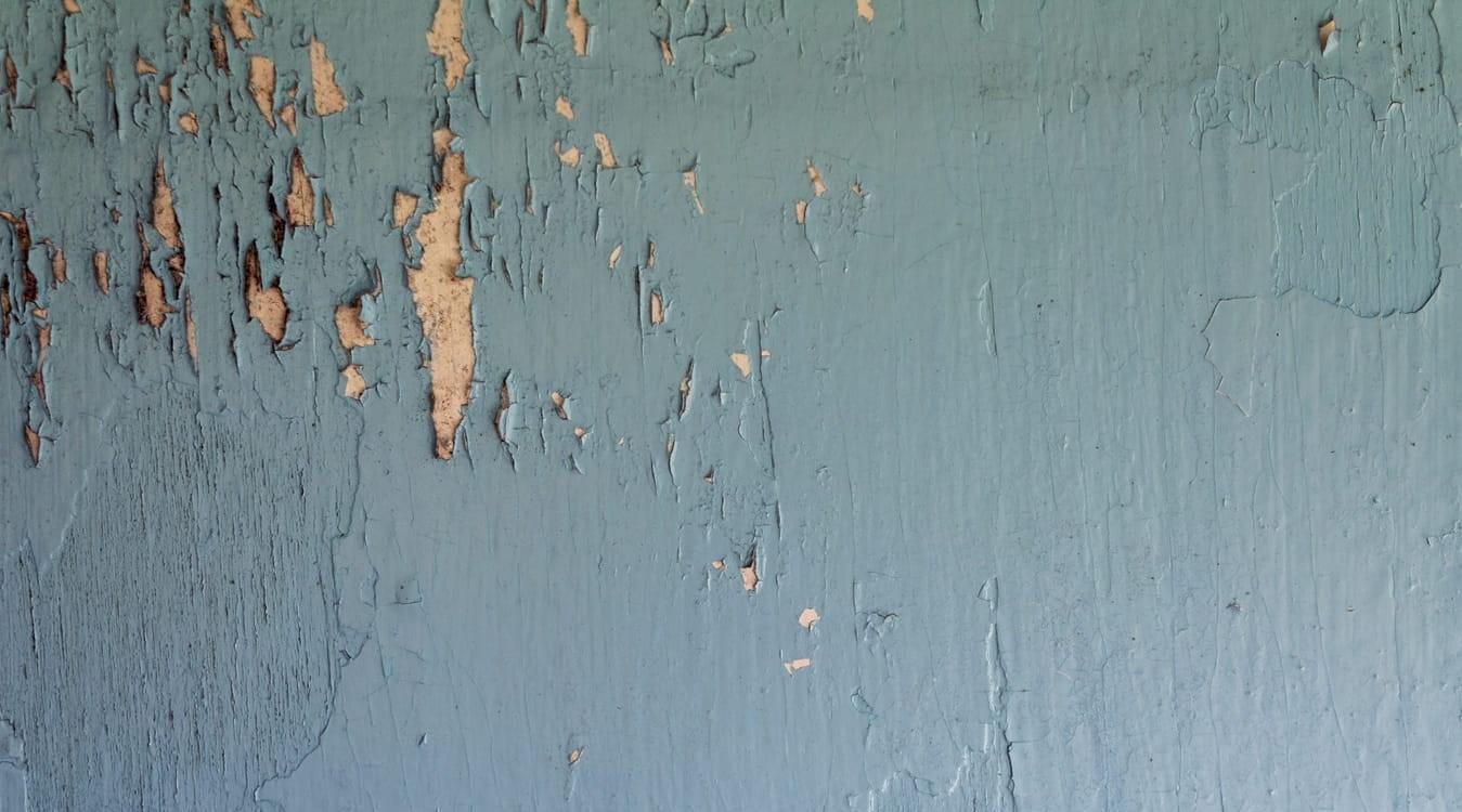 Painted wall old peeling paint textured background